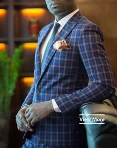 bespoke blue suit by Ghanaian tailor Adjei Anang