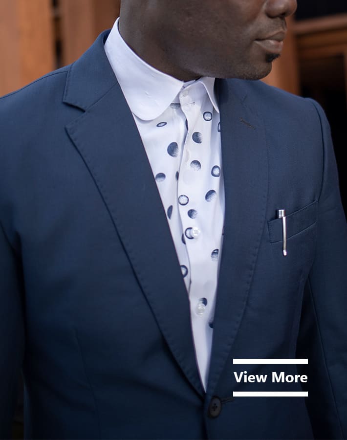 Custom made blue suit by Ghanaian tailor