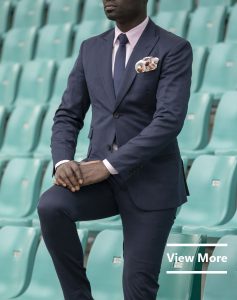 Custom made men's blue suit by Ghanaian tailor in Accra
