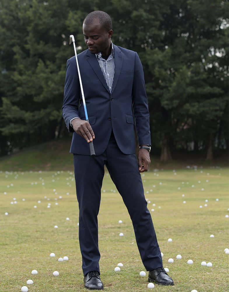 bespoke men's blue suit by Ghanaian tailor Adjei Anang in Accra bespoke men's blue suit by Ghanaian tailor Adjei Anang in Accra