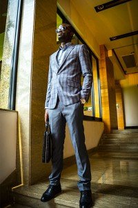 checked blazer by Ghanaian tailor