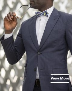 Custom made men's blue suits by Ghanaian tailor, Adjei Anang