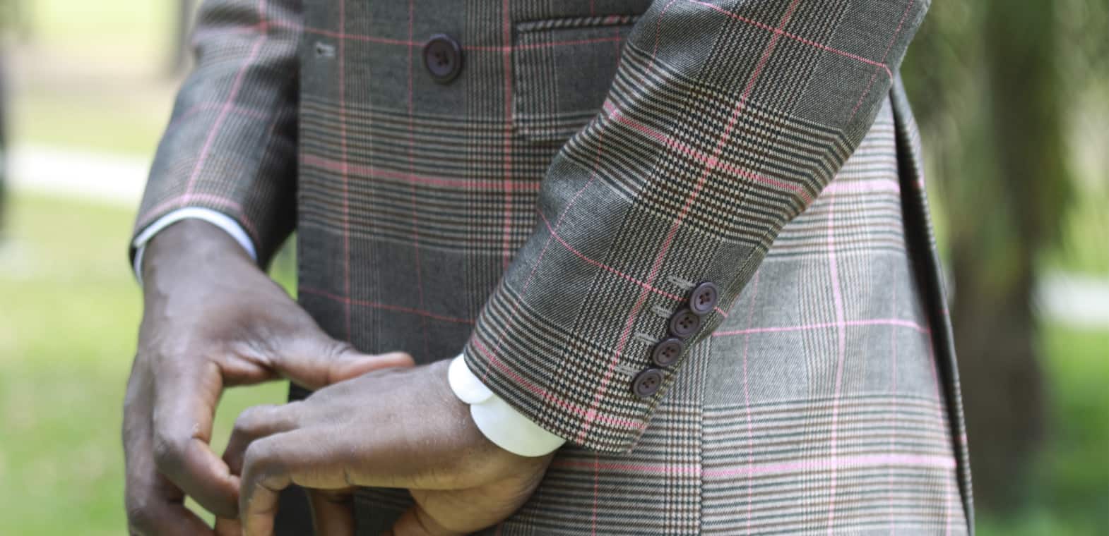 bespoke double-breasted suit by Ghanaian tailor