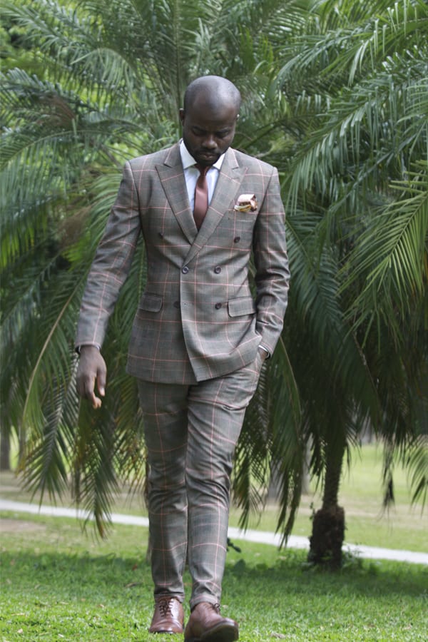 bespoke double-breasted suit by Ghanaian tailor