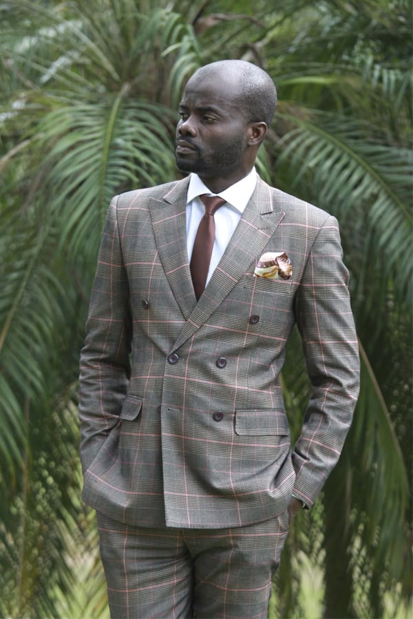 bespoke double-breasted suit by Ghanaian tailor