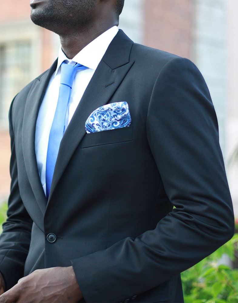 bespoke black suit by Ghanaian tailor Adjei Anang