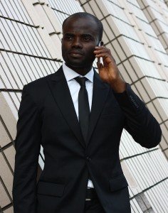 Tailor-made black suit by Ghanaian tailor Adjei Anang