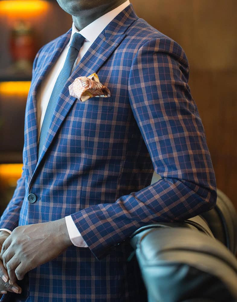 bespoke men's blue suit by Ghanaian tailor Adjei Anang in Accra