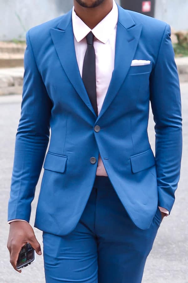 bespoke men's blue suit by Ghanaian tailor