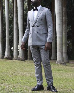Tailored double-breasted suit by Ghanaian tailor, Adjei Anang