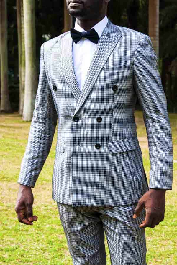 tailored double-breasted suit by Ghanaian tailor Adjei Anang