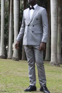 tailored double-breasted suit by Ghanaian tailor Adjei Anang