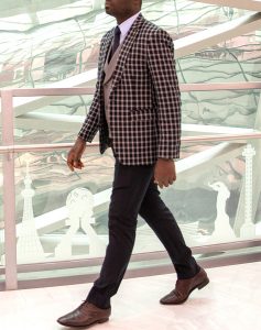 custom made checked blue and grey suit by Ghanaian tailor in Accra