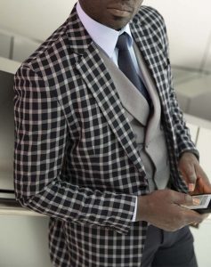 Custom made three-piece blue suit by Ghanaian tailor in Accra